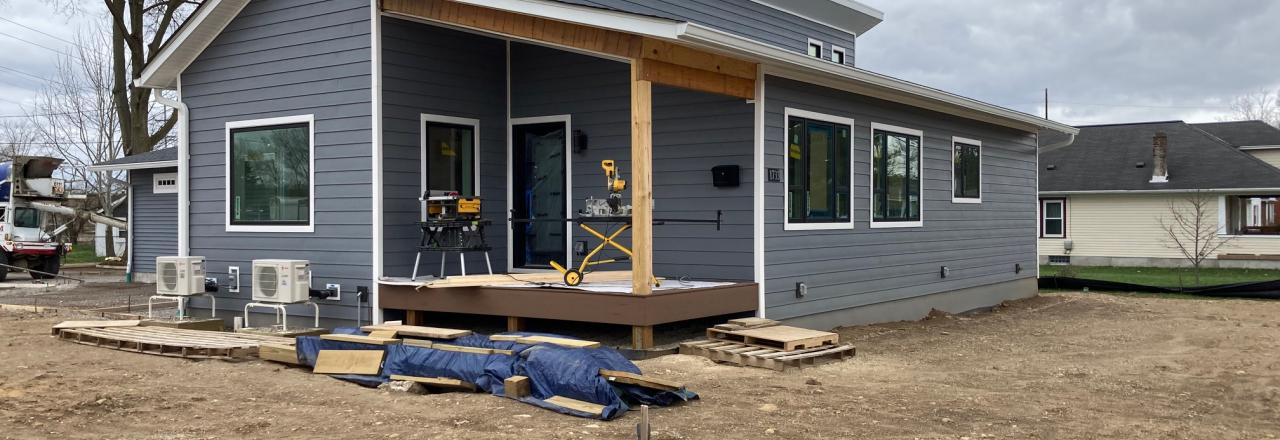 home with tools on the front porch